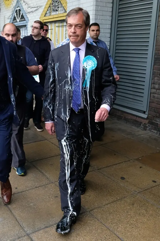 Nigel Farage covered in milkshake