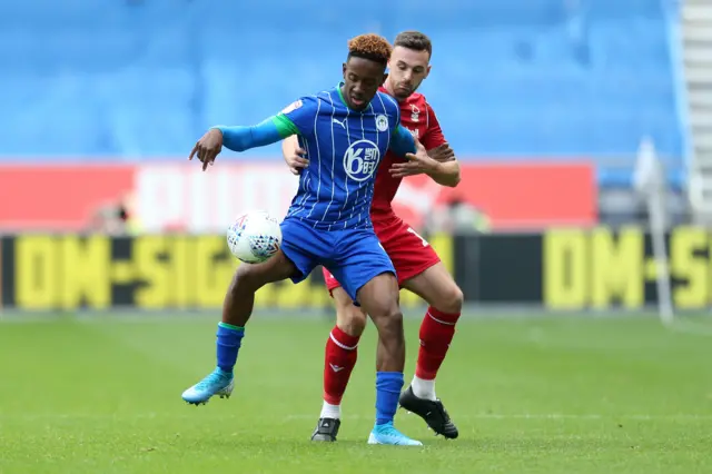 Jamal Lowe on the ball for Wigan against Forest