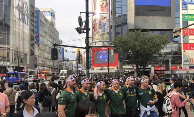 South Africa fans take a photo at Shibuya crossing