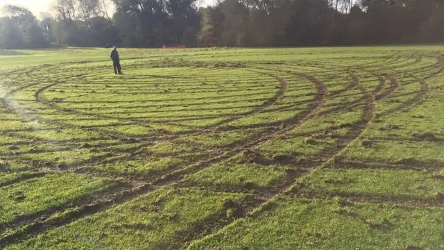 Badly rutted football pitch