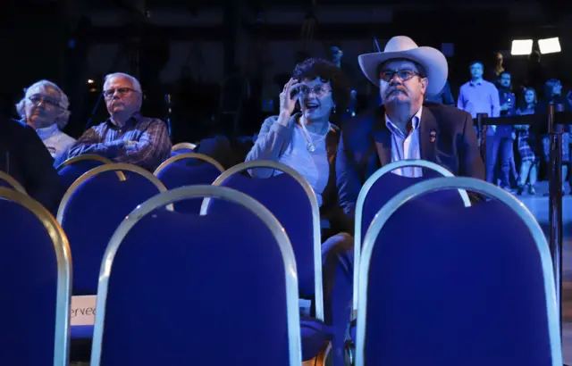 Conservative supporters at the party's headquarters in Regina