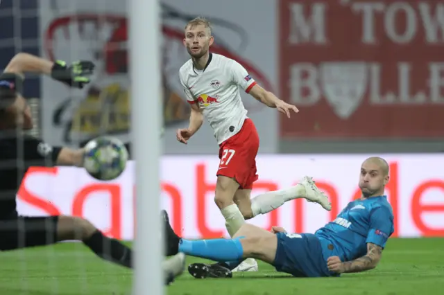 Konrad Laimer of RB Leipzig scores his team"s first goal during the UEFA Champions League group G match between RB Leipzig and Zenit St. Petersburg