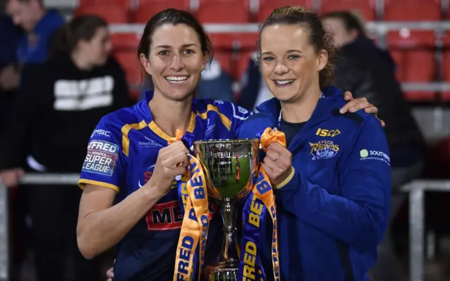 Courtney Hill and Lois Forsell (right) celebrate afer winning the Super League Cup