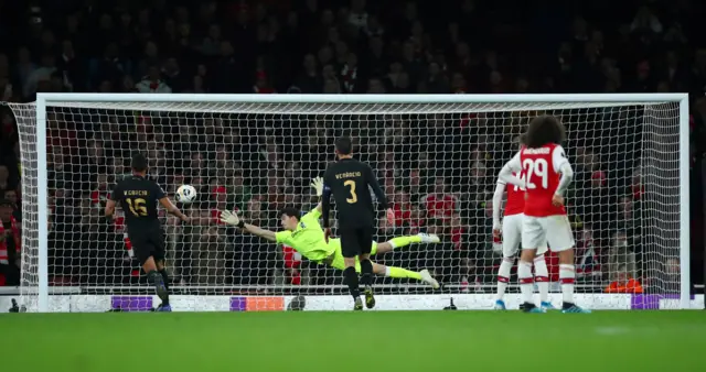 Arsenal's Nicolas Pepe (not pictured) scores their second goal as Vitoria's Miguel Silva dives