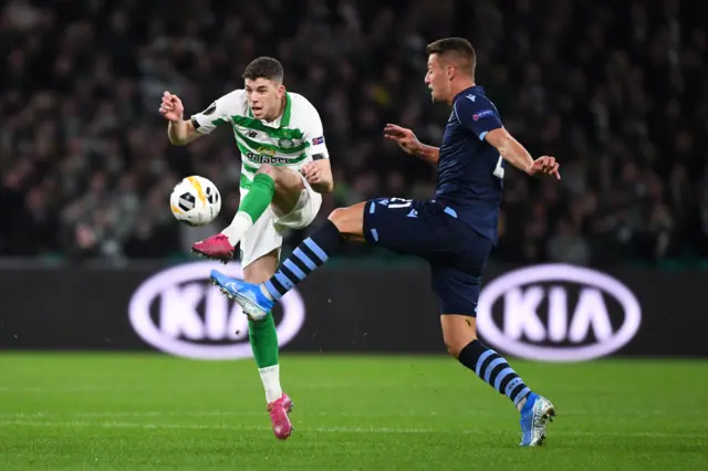 Ryan Christie in action with Lazio's Sergej Milinkovic-Savic