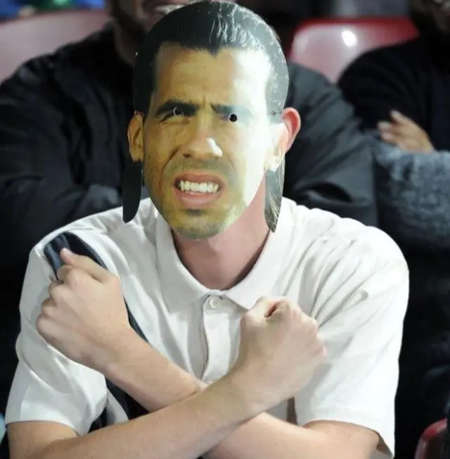 Carlos Tevez mask on fan