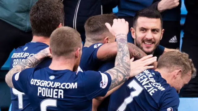 Gary Dicker (right) celebrates his winner for Kilmarnock