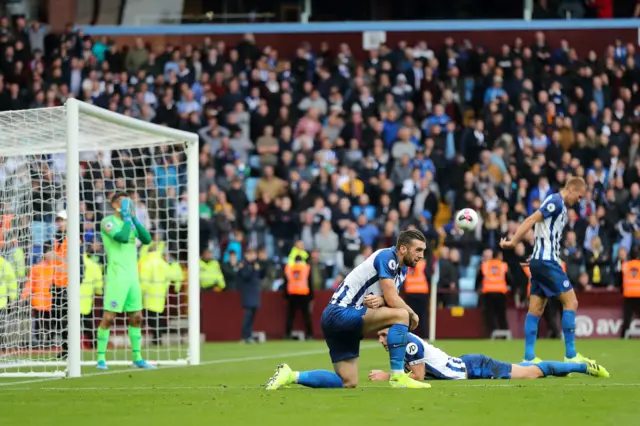 Brighton players on the floor after Aston Villa's late goal last week