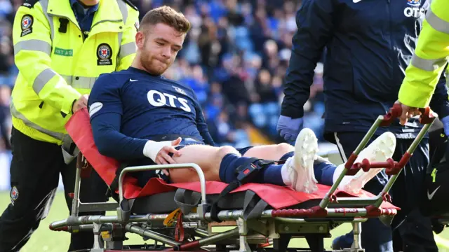 Scotland defender Stuart Findlay departed the action early with an injury