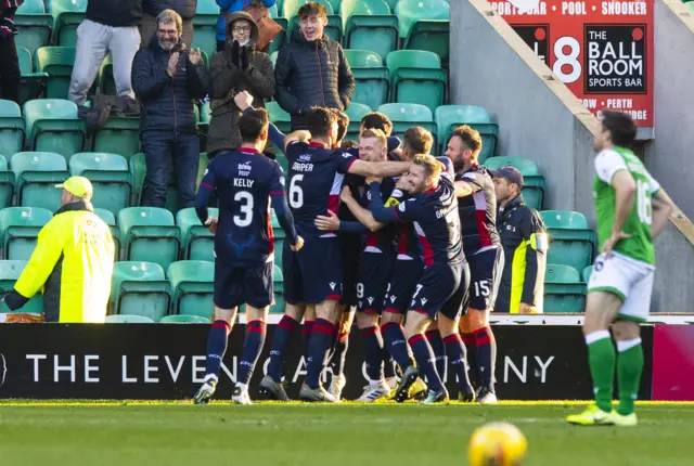 Joe Chalmers fired in a late equaliser at Easter Road