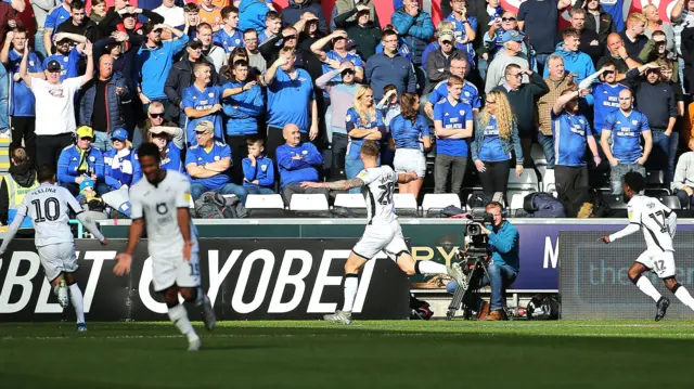 Ben Wilmot celebrates his goal in front of the Swansea fans