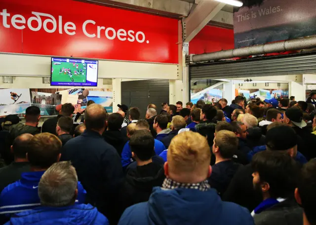 Football fans watch Wales v South Africa in the Liberty Stadium