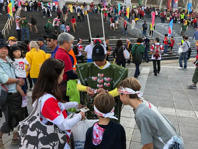 A man dressed as a rugby pitch