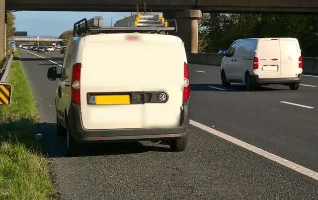 A driver on the side of the M18