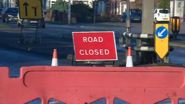 Road closed sign