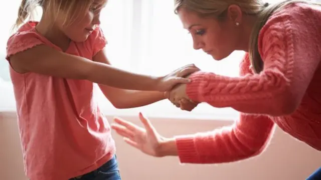 Girl being smacking