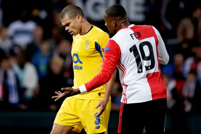 Porto's Pepe and Feyenoord's Leroy Fer