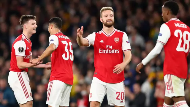 Kieran Tierney (left) celebrates for Arsenal