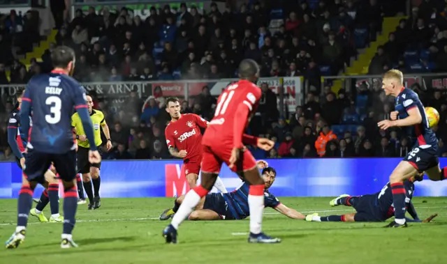 Ryan Jack watches the ball bend into the bottom corner for his first of the night