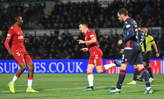 Ryan Jack celebrates making it 2-0 for Rangers in Dingwall