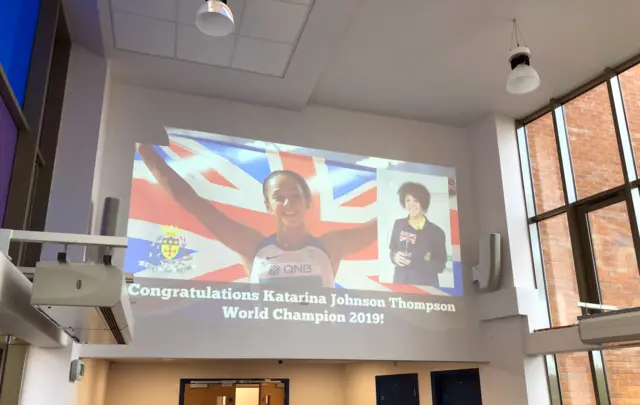 A projection of Katarina Johnson-Thompson at her old school