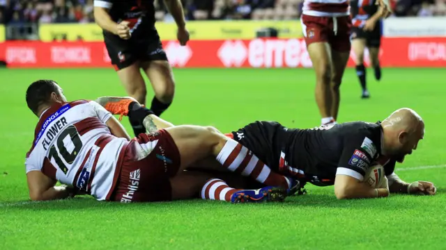 Gil Dudson of Salford Red Devils scores his teams first try of the game