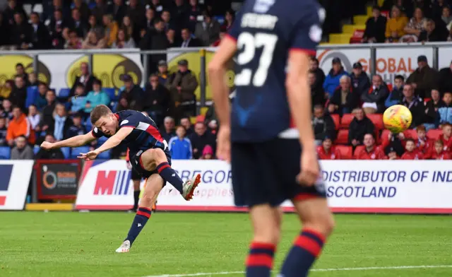 Blair Spittal scores his free-kick to level the scores