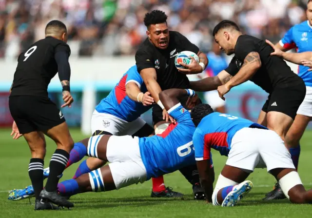 Ardie Savea is tackled