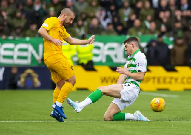 Ryan Christie tackles Scott Robinson