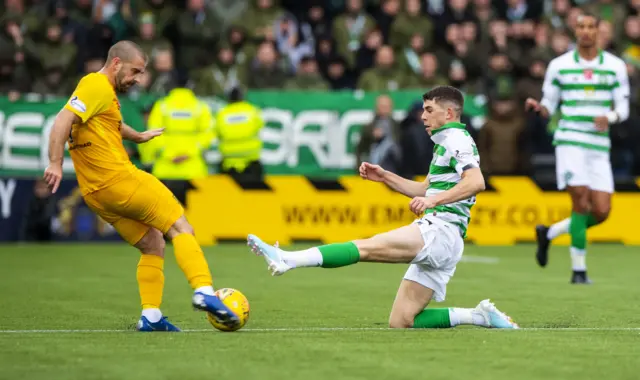 Ryan Christie tackles Scott Robinson