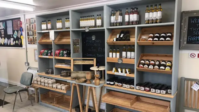 A shelf of produce