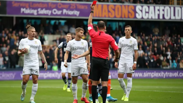 Gaetano Berardi, centre, is sent off for Leeds United against Millwall