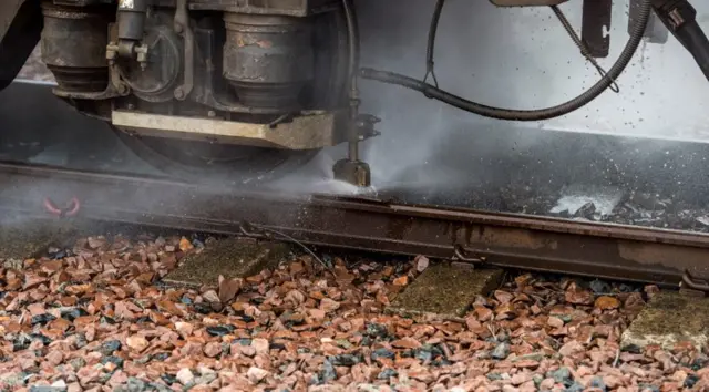 A train blasting dry ice