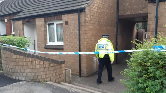 Police in a ginnel