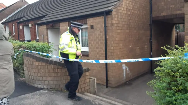 A police officer at the scene