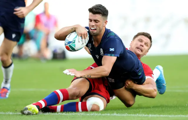 Adam Hastings scores a try