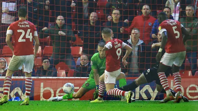 Cauley Woodrow scores