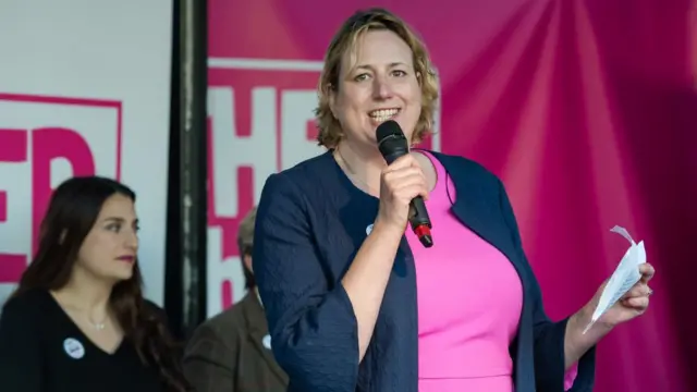 Conservative MP Antoinette Sandbach speaks during a rally in Parliament Square