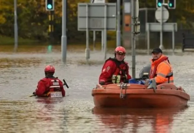 Rescuers used boats to reach people trapped in Rotherham