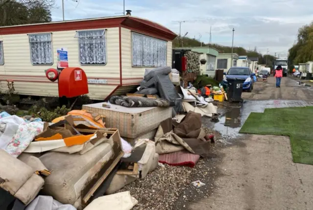 Flooding debris at caravan site