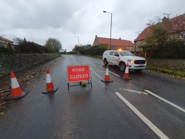 Road closed sign