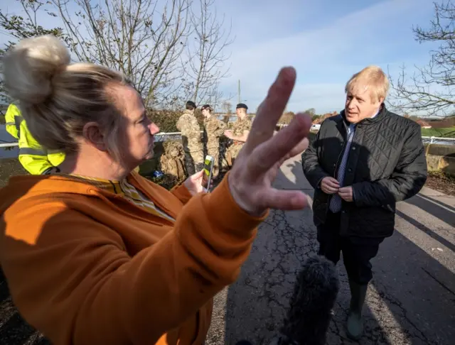 Boris Johnson with flood victims in Yorkshire