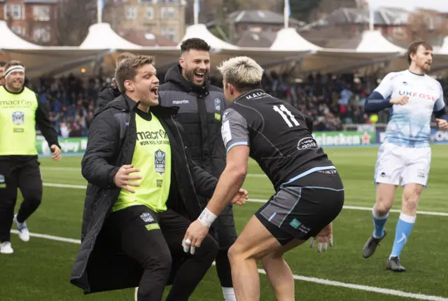 Glasgow celebrate their try