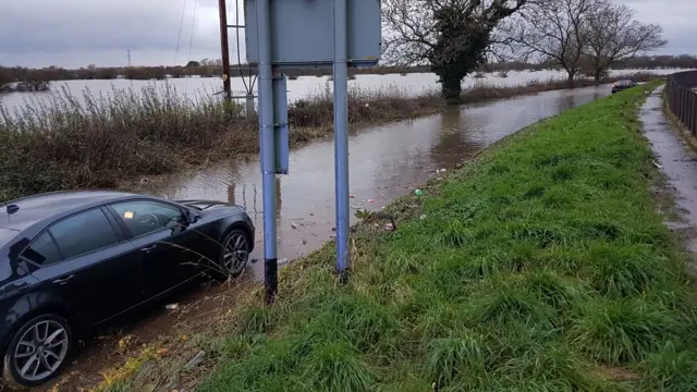 A car before floodwater