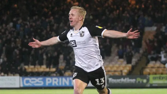 Port Vale's Mark Cullen celebrates scoring his side's second goal during the Sky Bet League Two match between Port Vale and Carlisle United