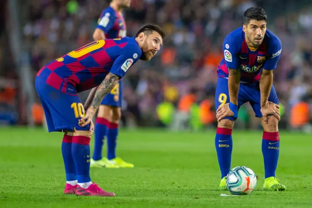 Lionel Messi and Luis Suarez