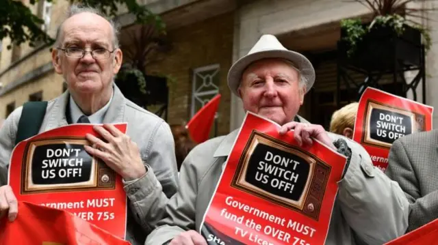 Protesters  gathered outside the BBC to protest against plans to axe free TV licences for the over-75s.