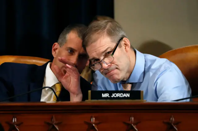 Jim Jordan (right) consults with Republican counsel Steve Castor