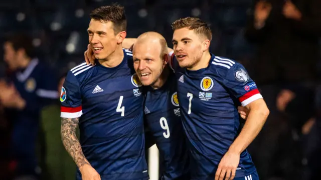 Steven Naismith is congratulated by Ryan Jack and James Forrest