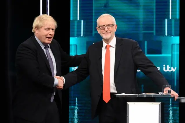 Boris Johnson and Jeremy Corbyn shake hands